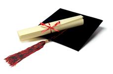 Image of a graduation hat and diploma.