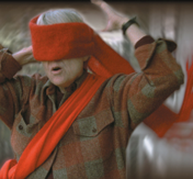 Image of a soldier flailing with a scarf around his eyes, created by Alice Wingwall.