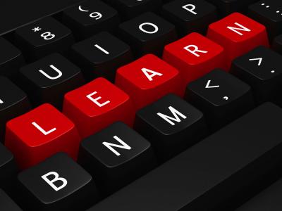 Photo of a keyboard with the letters rearranged to read "learn."